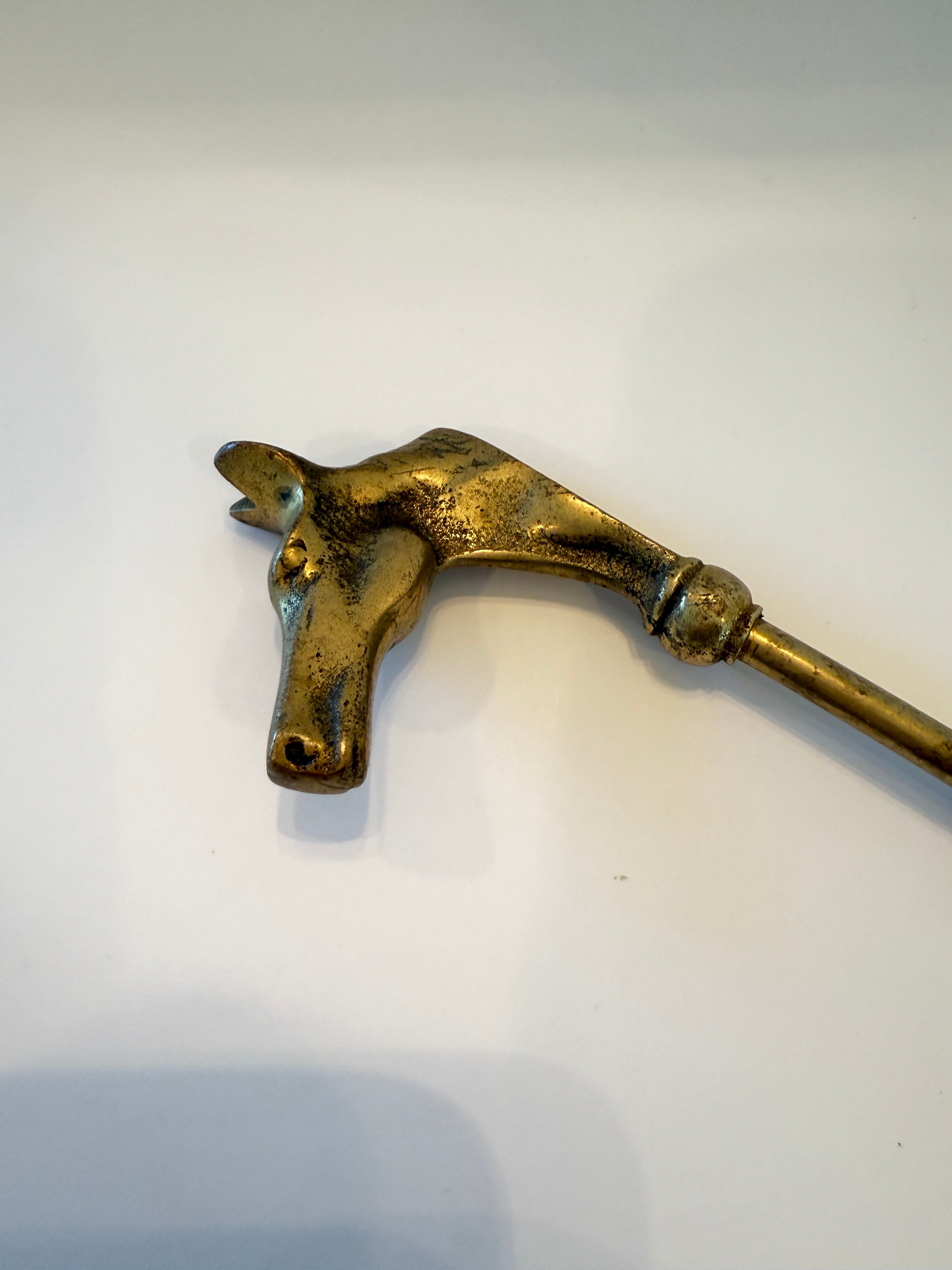 Calzascarpe vintage in ottone a forma di testa di cavallo