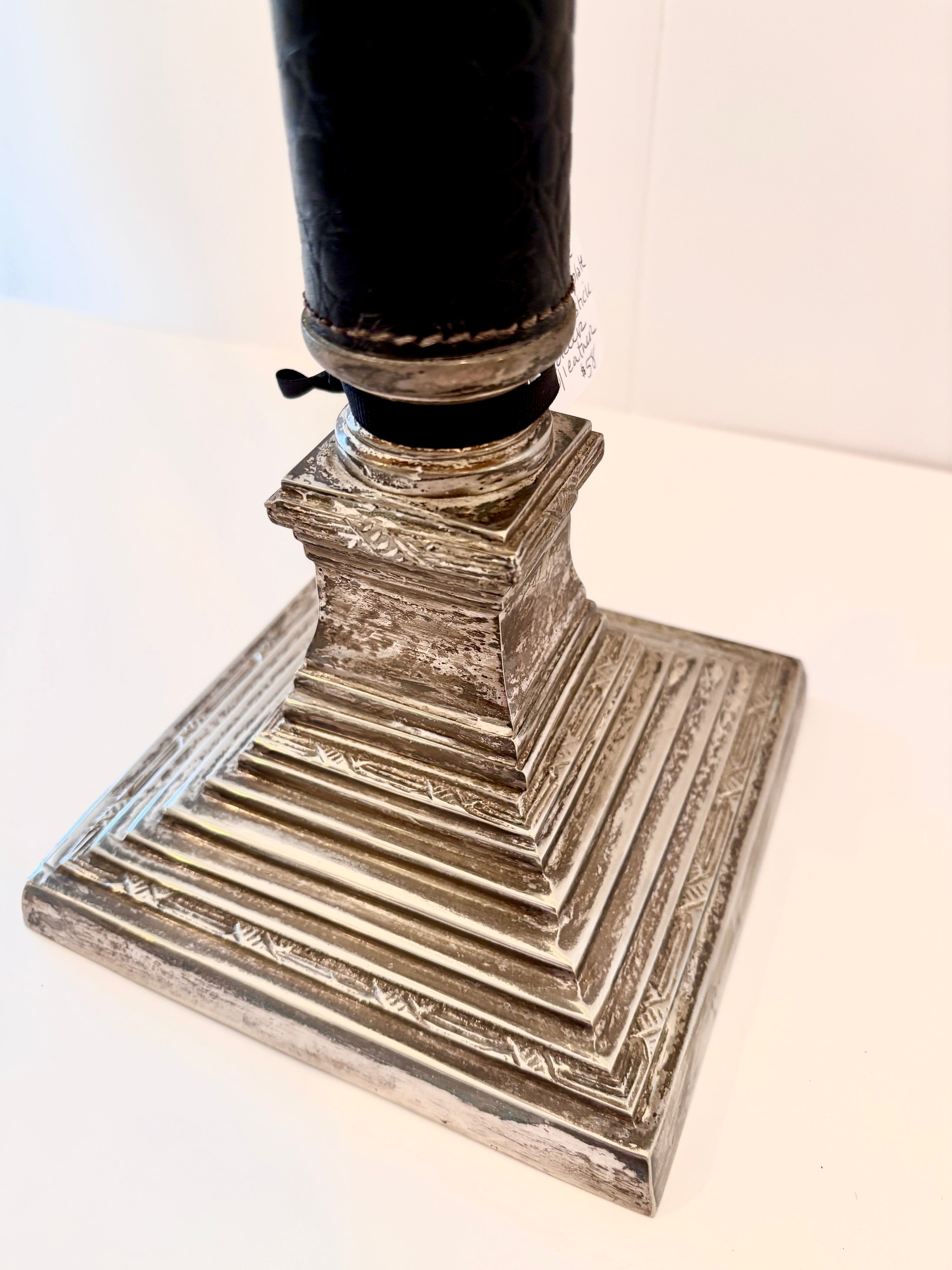 Silver and leather candlestick, base detail