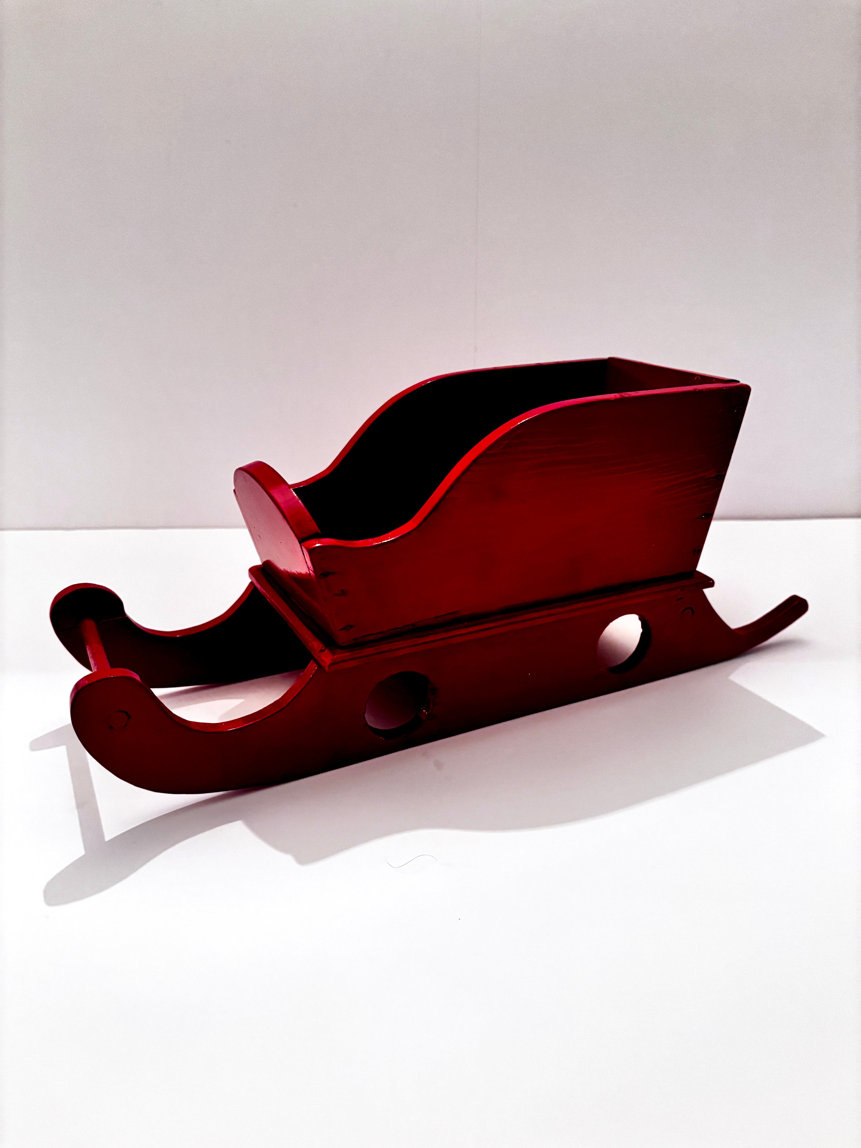 Vintage wooden sleigh painted holiday red