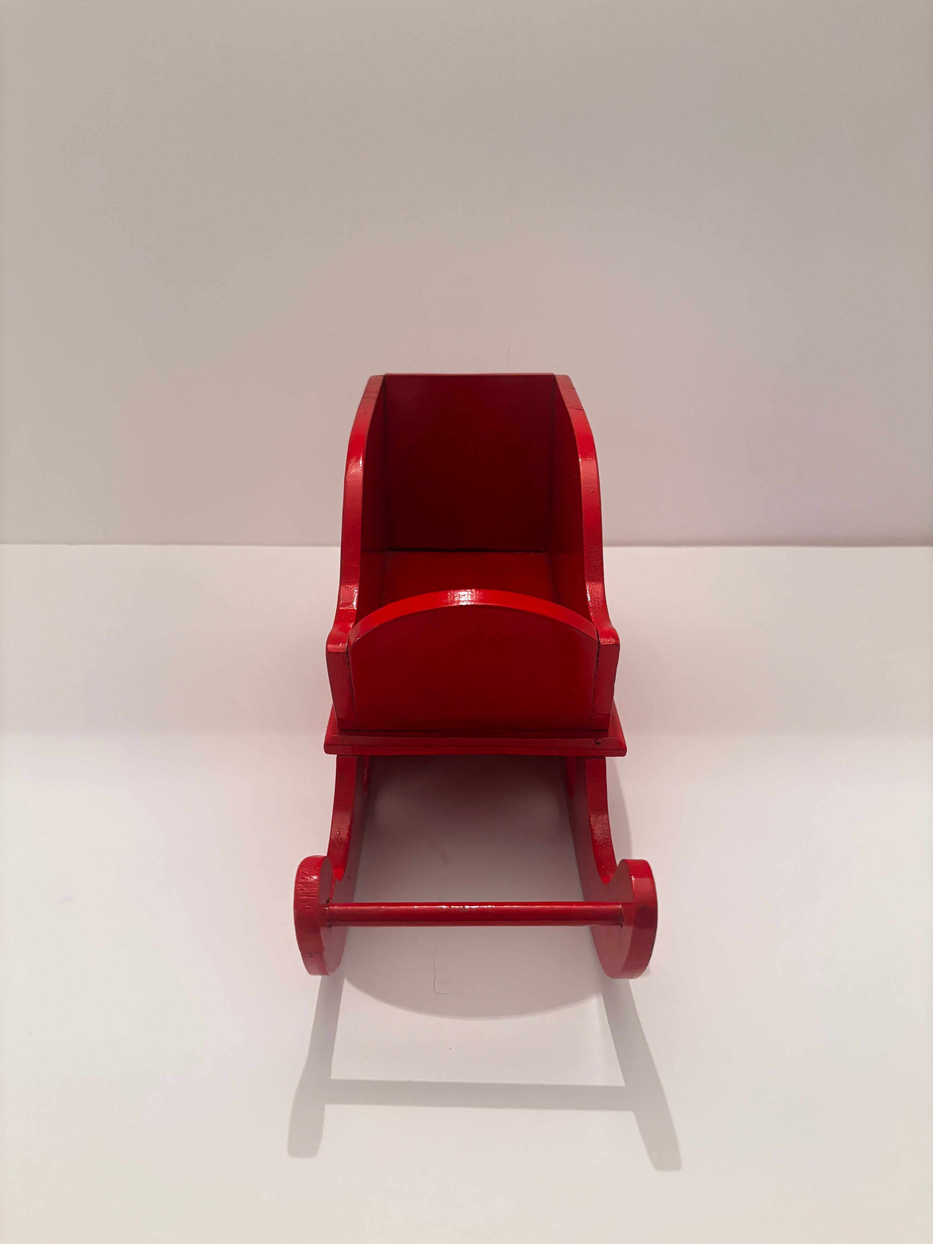 Vintage red wooden sleigh, detail view