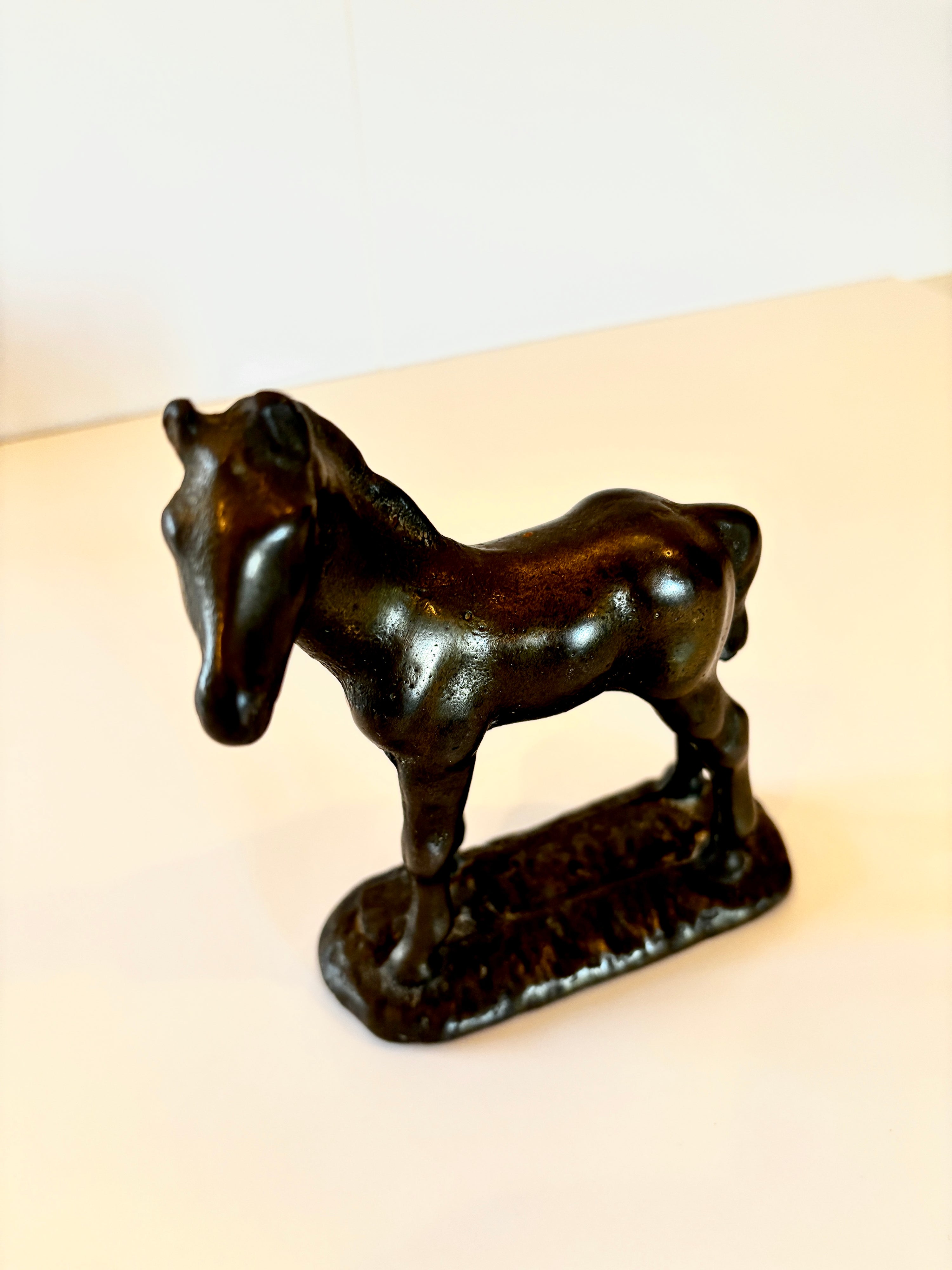 Vintage cast iron pony figurine, detail of the cast texture