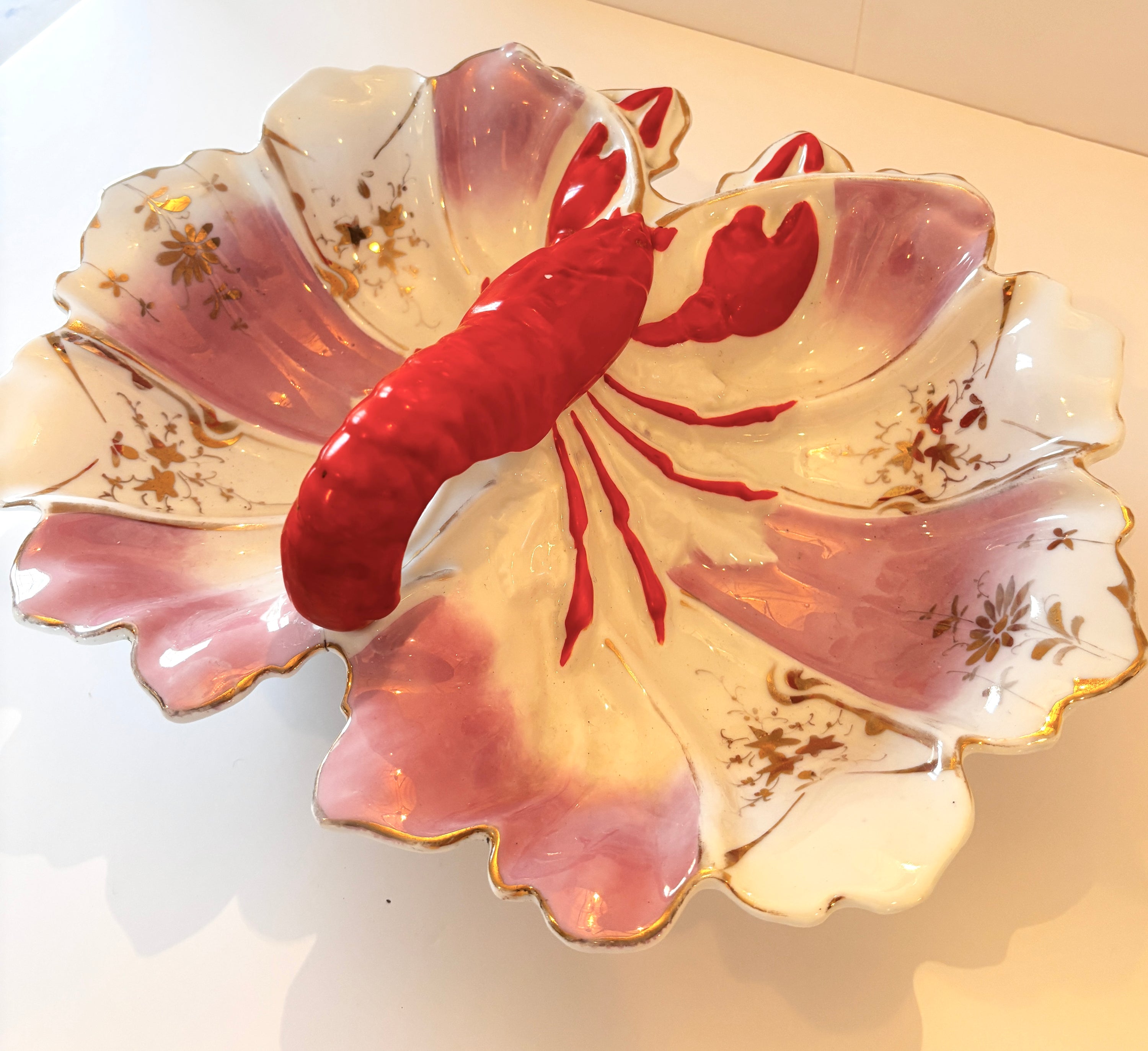 Vintage lobster dish, detail of the sculpted red lobster