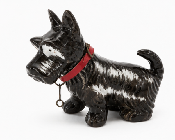 Figurine vintage de Shnouzer noir avec détails rouges. Fabriquée au Japon.