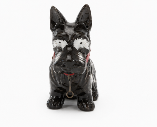 Figurine vintage de Shnouzer noir avec détails rouges. Fabriquée au Japon.