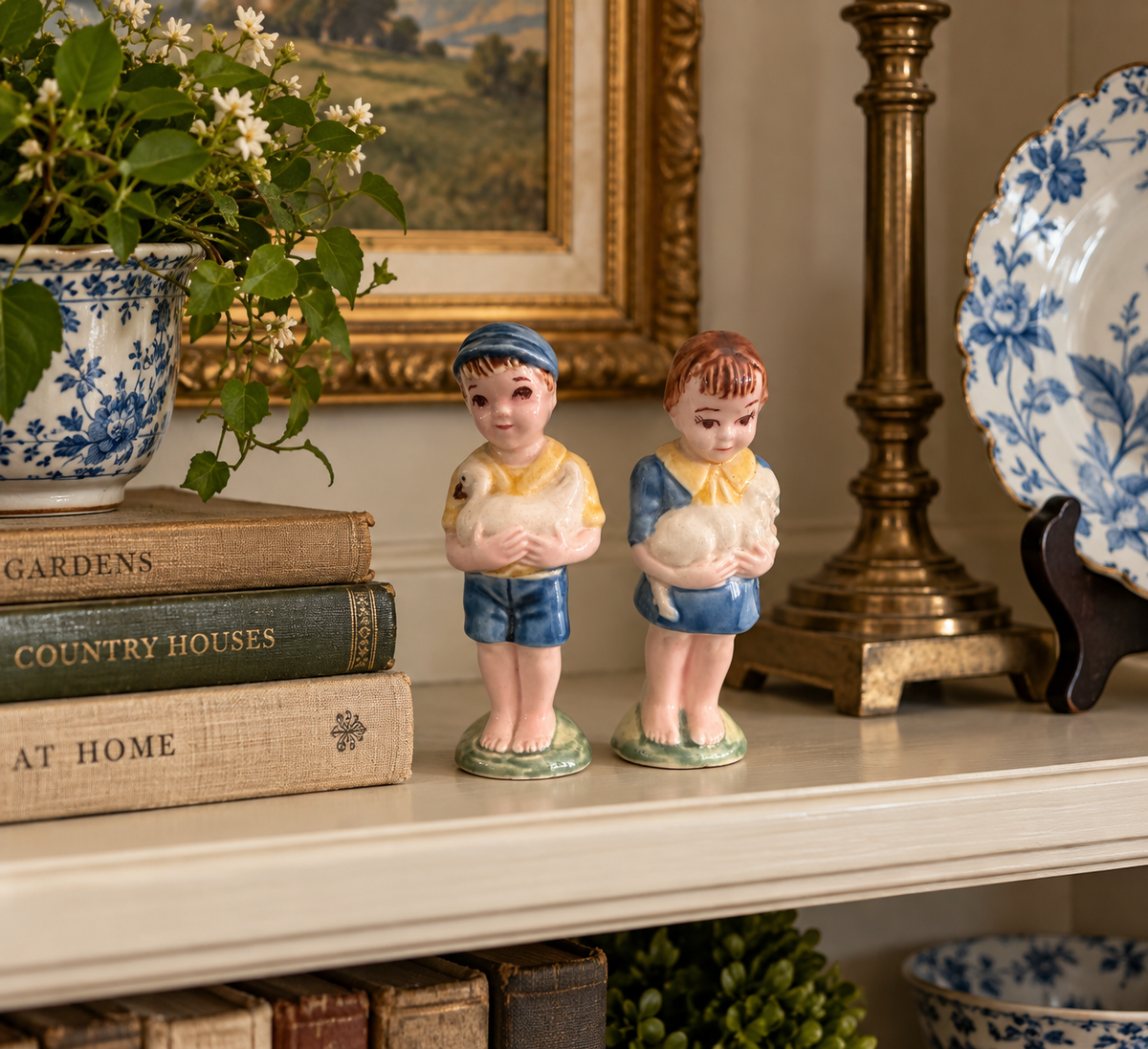 Vintage Porcelain Boy and Girl Figurines Holding White Animals – Set of 2