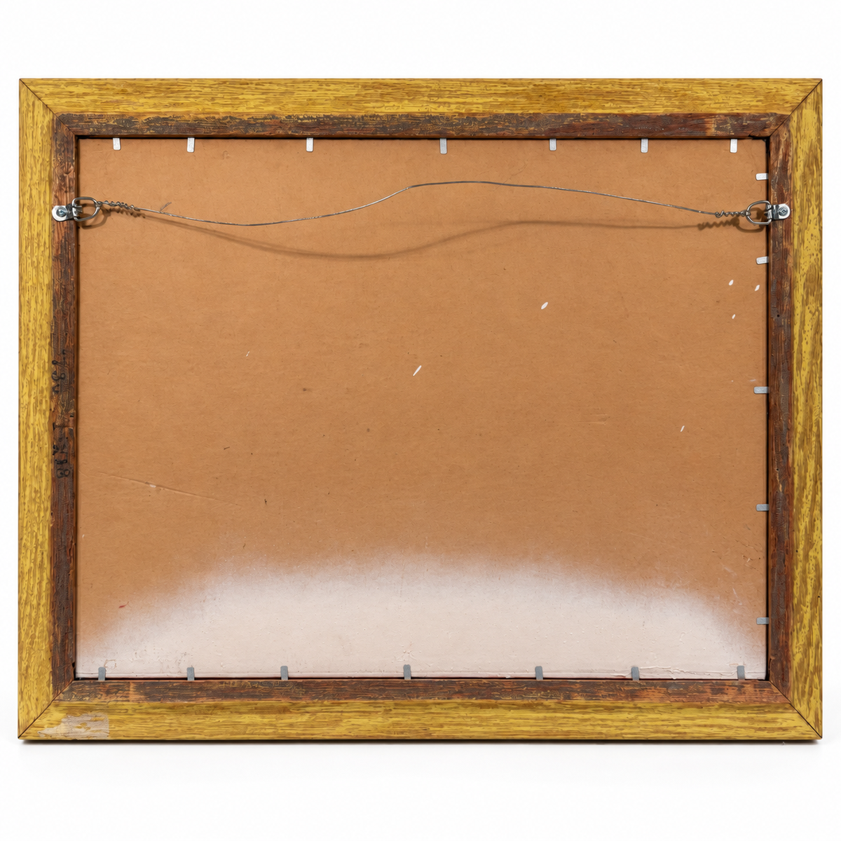 Back of painting frame with hanging wire and paper backing