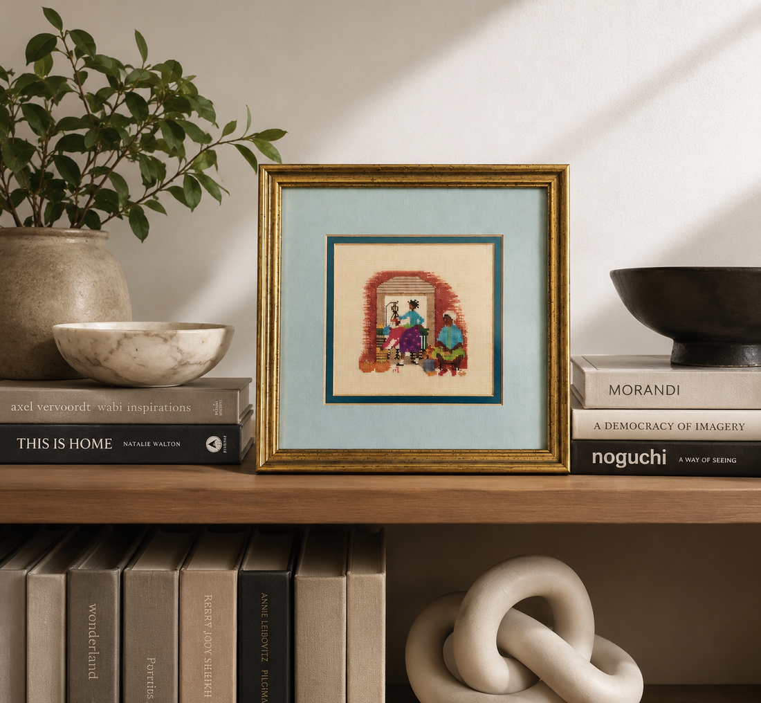 Scena domestica vintage con donne e zucche realizzata a punto croce