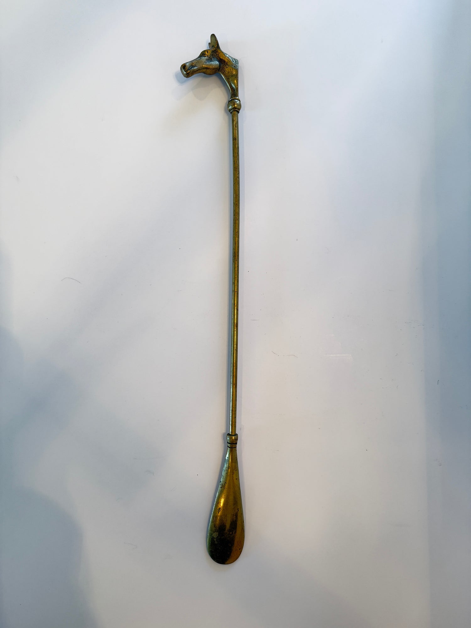 Calzascarpe vintage in ottone a forma di testa di cavallo