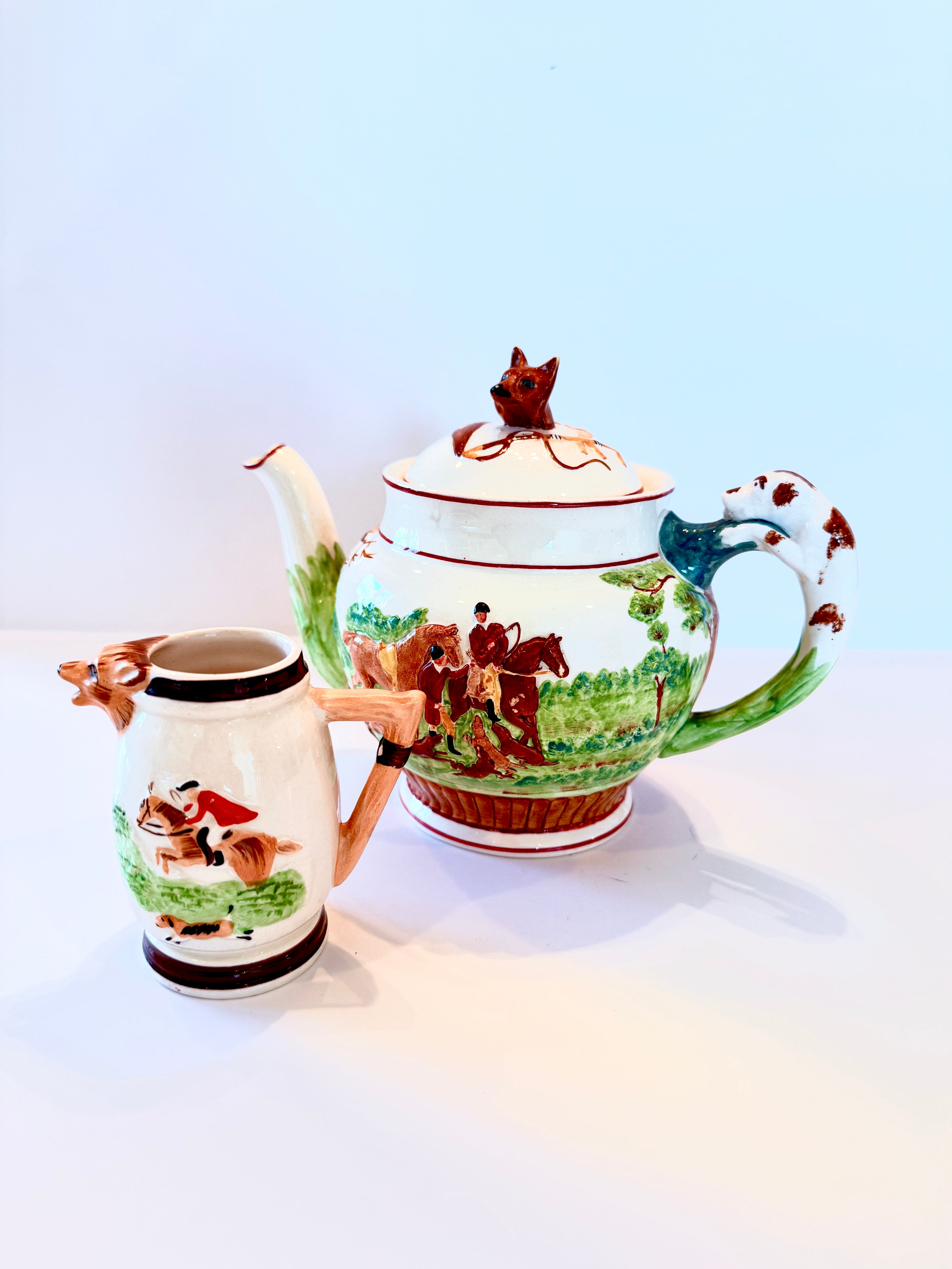 Hand-painted Wedgwood John Peel hunt-scene teapot with a fox finial and hound handle, and matching creamer