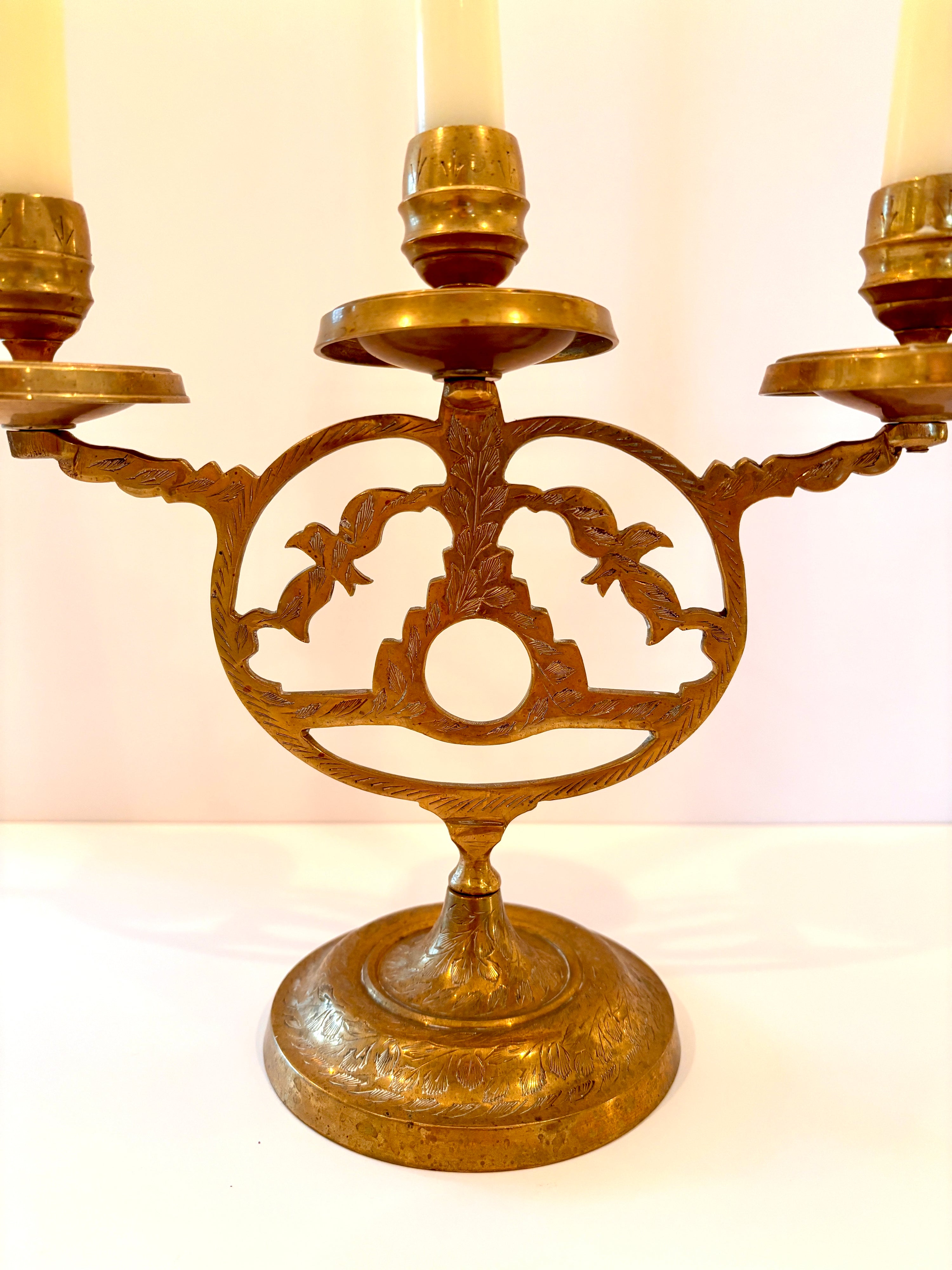 Vintage brass candelabra, detail of the arms