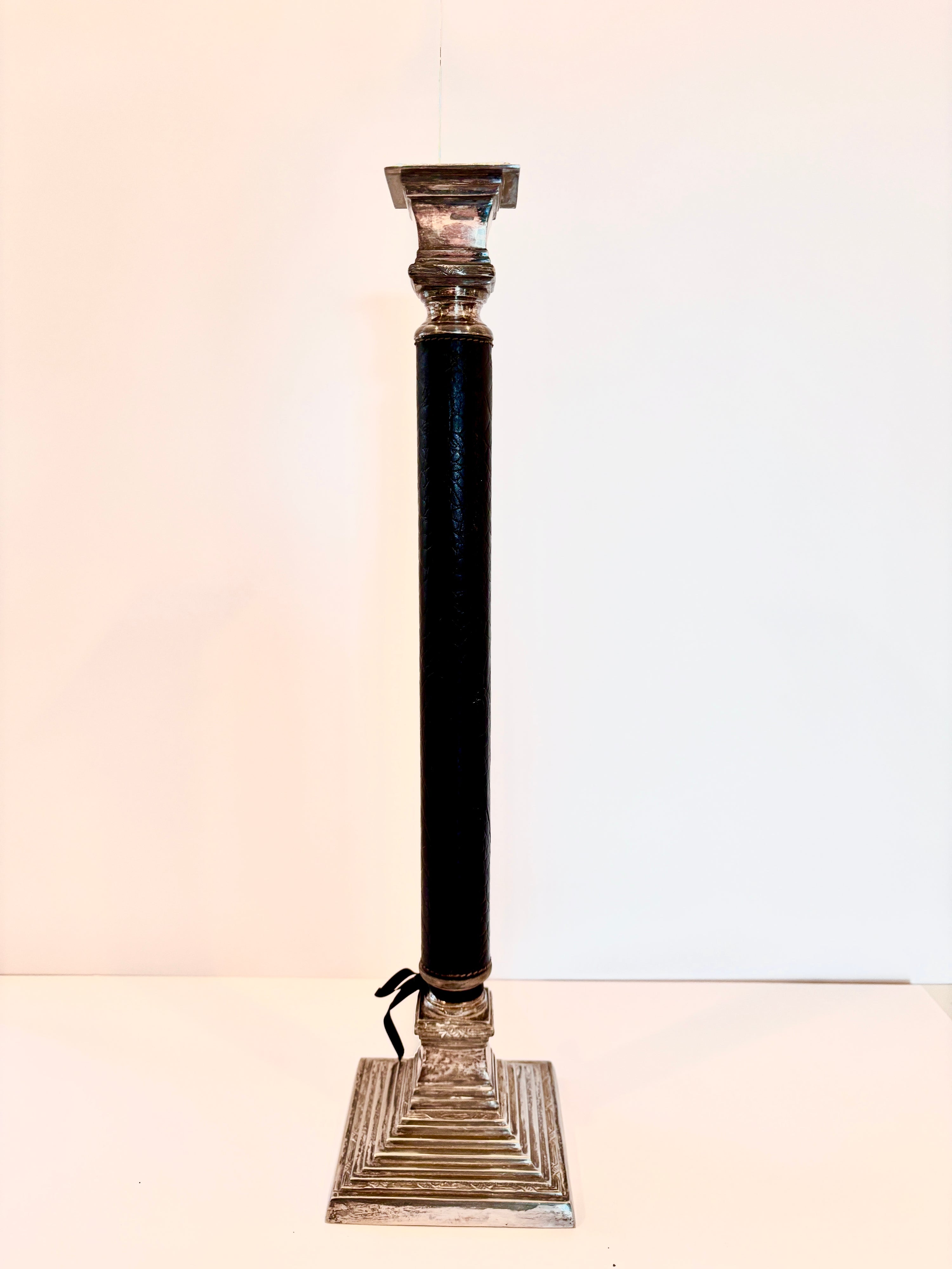 Tall vintage silver-plated candlestick with a leather-wrapped stem, 21 inches