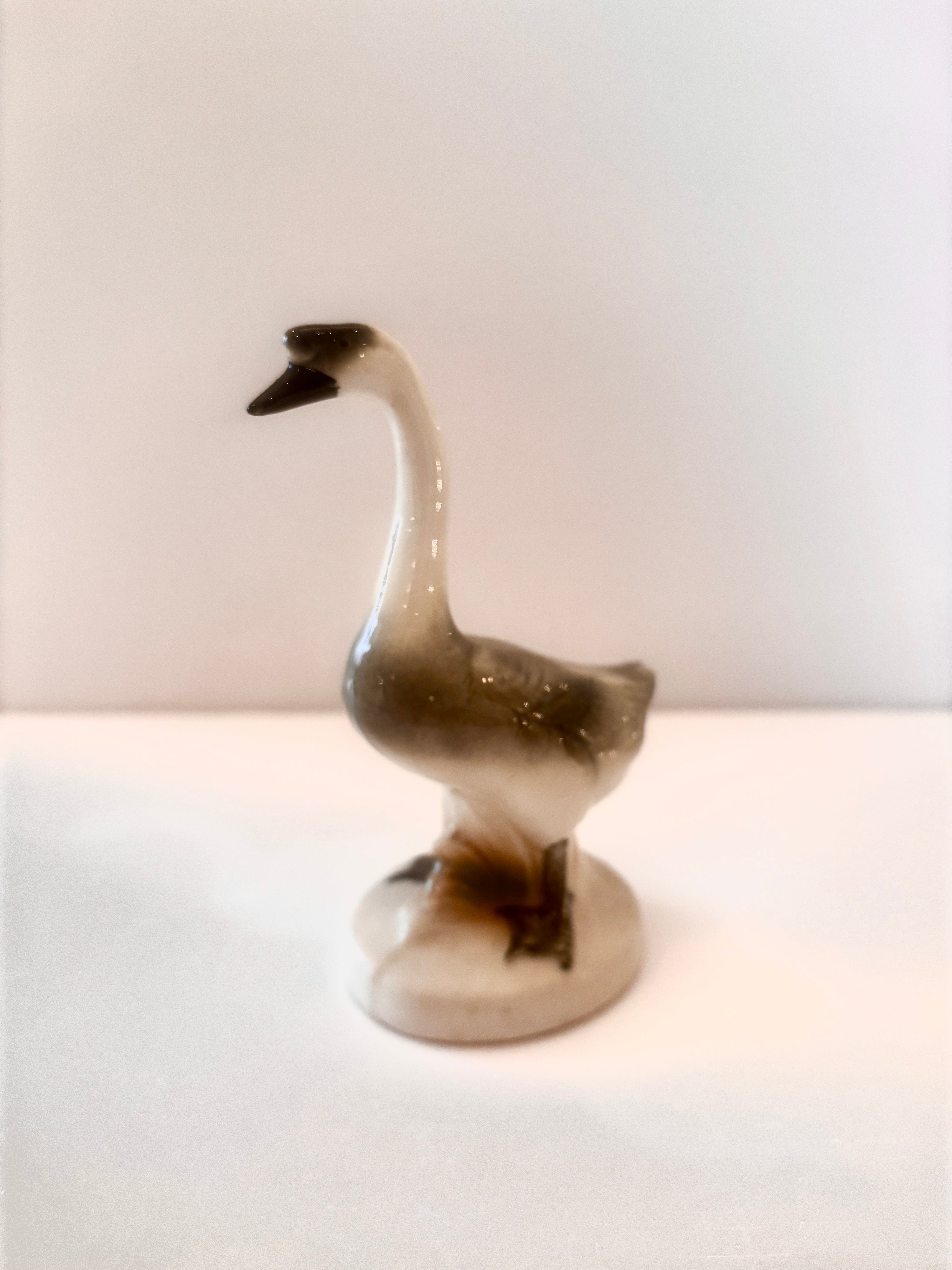 Vintage hand-painted German ceramic goose figurine in earthy tones