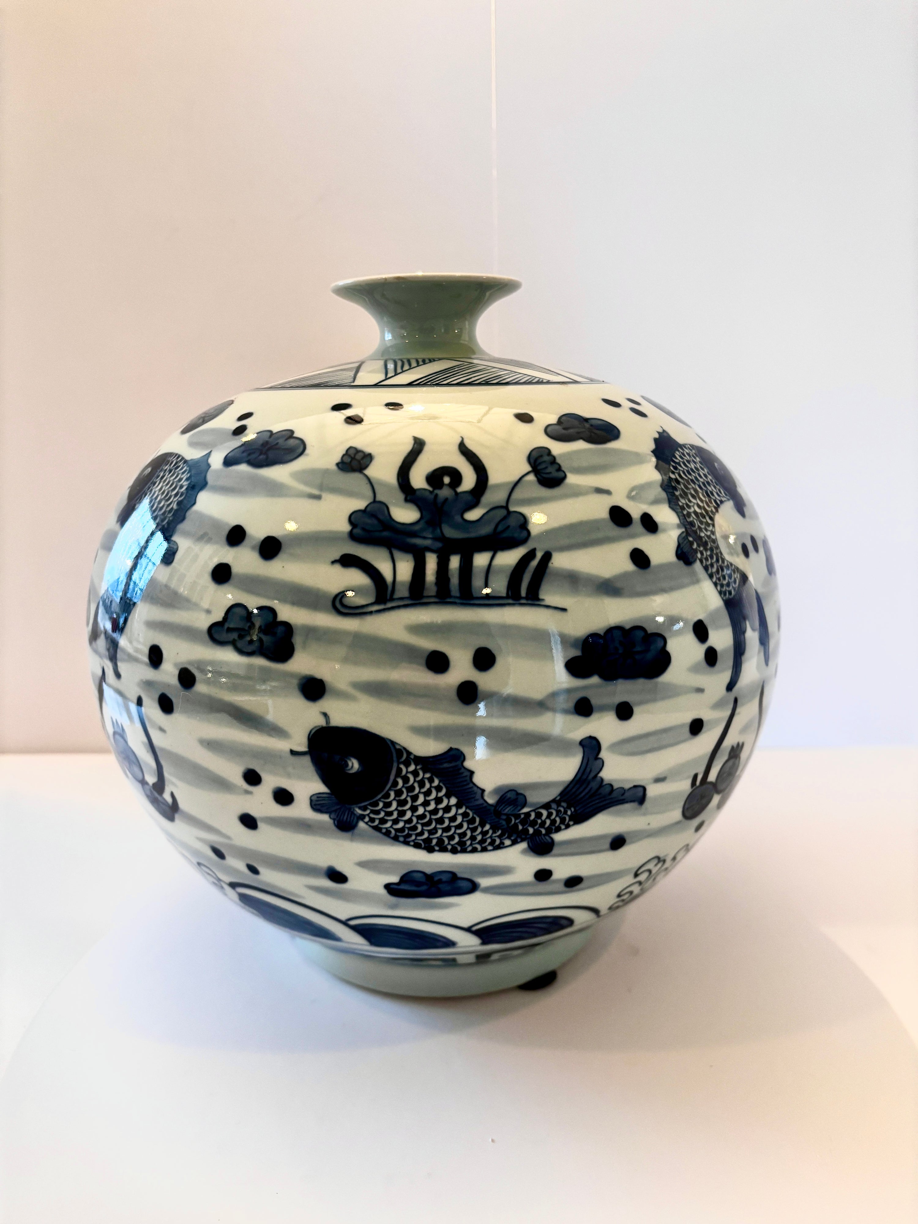 Koi-motif blue and white porcelain vase, side view