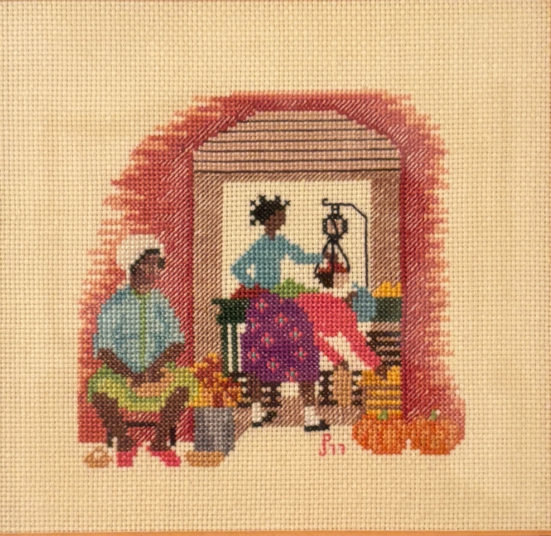 Vintage 9-inch needlepoint of three women among pumpkins and produce