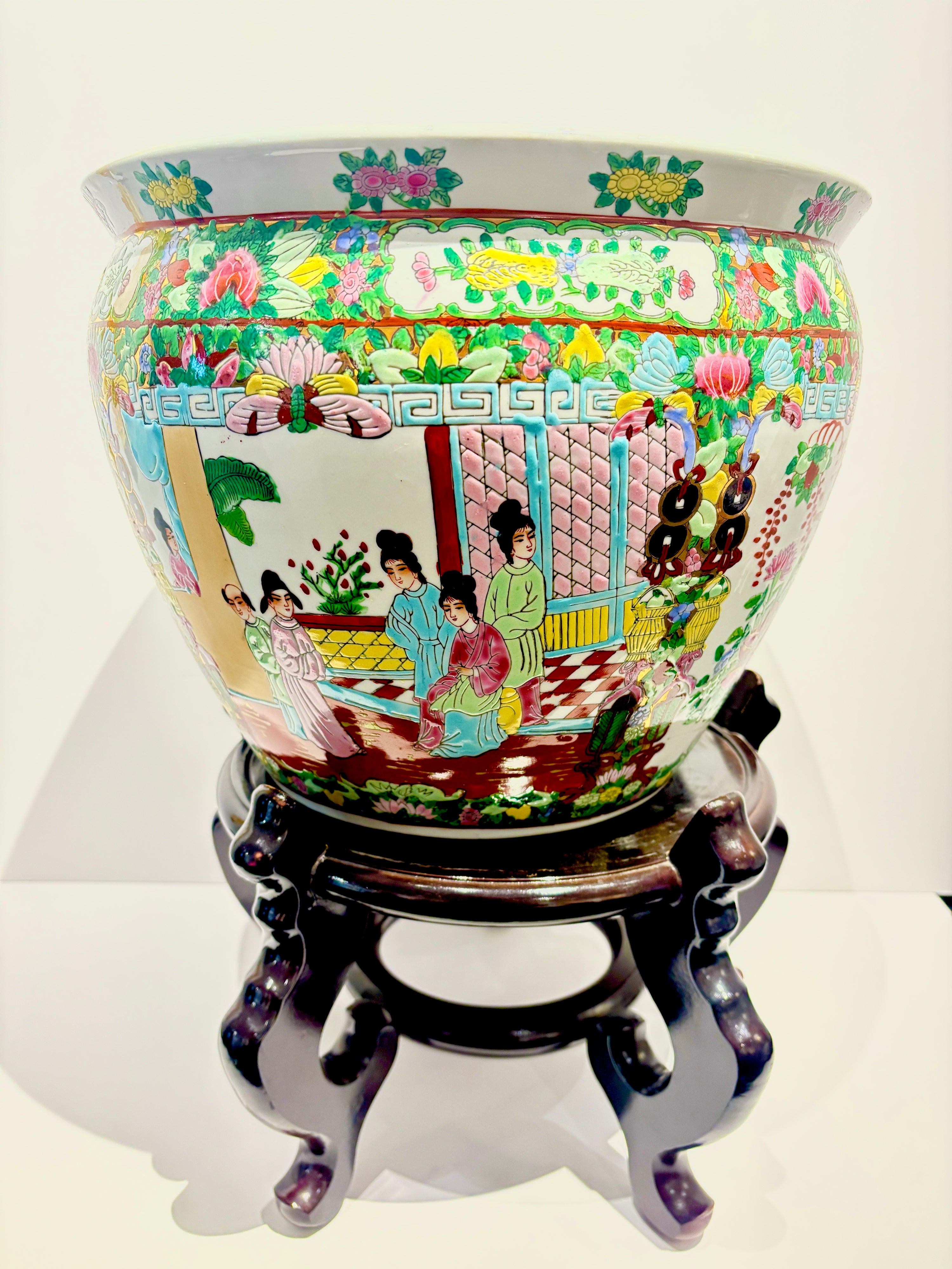 Rose Famille hand-painted porcelain planter with florals on a wooden stand