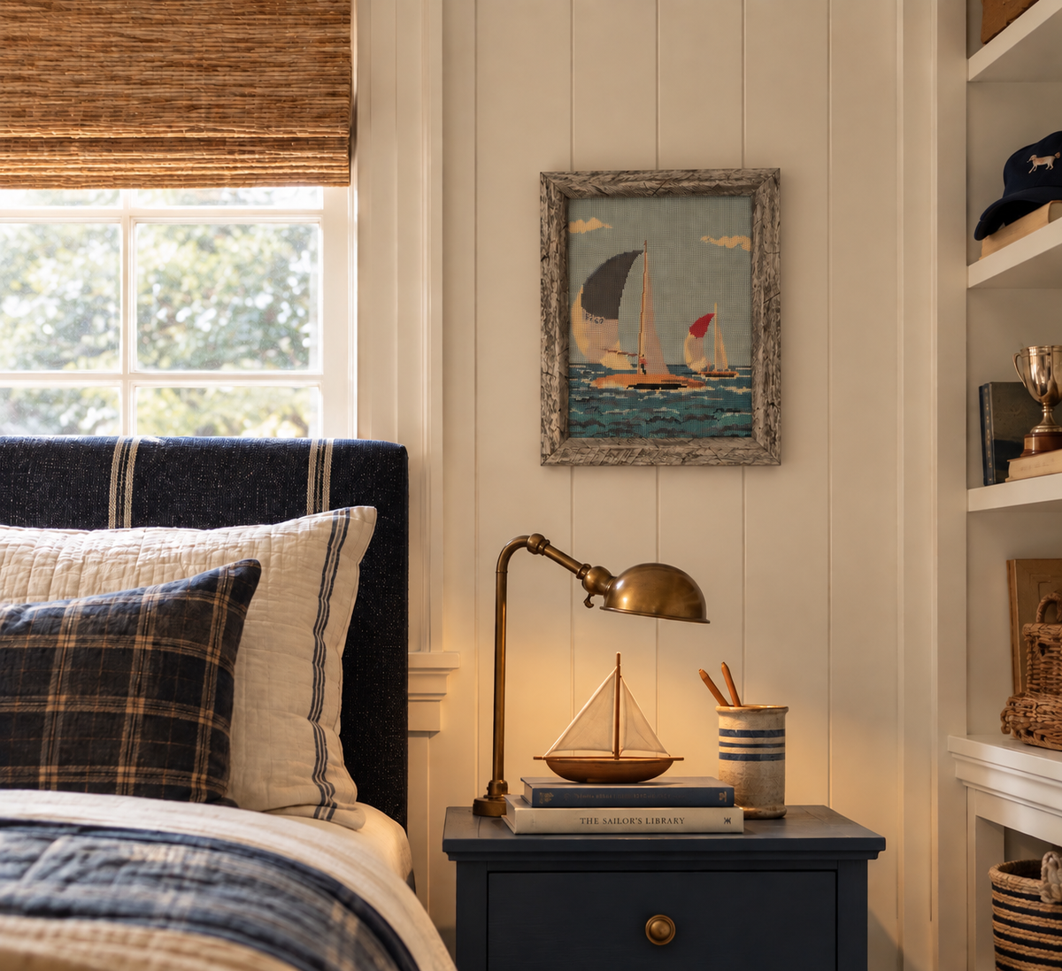Vintage sailboat needlepoint in a weathered gray wood frame