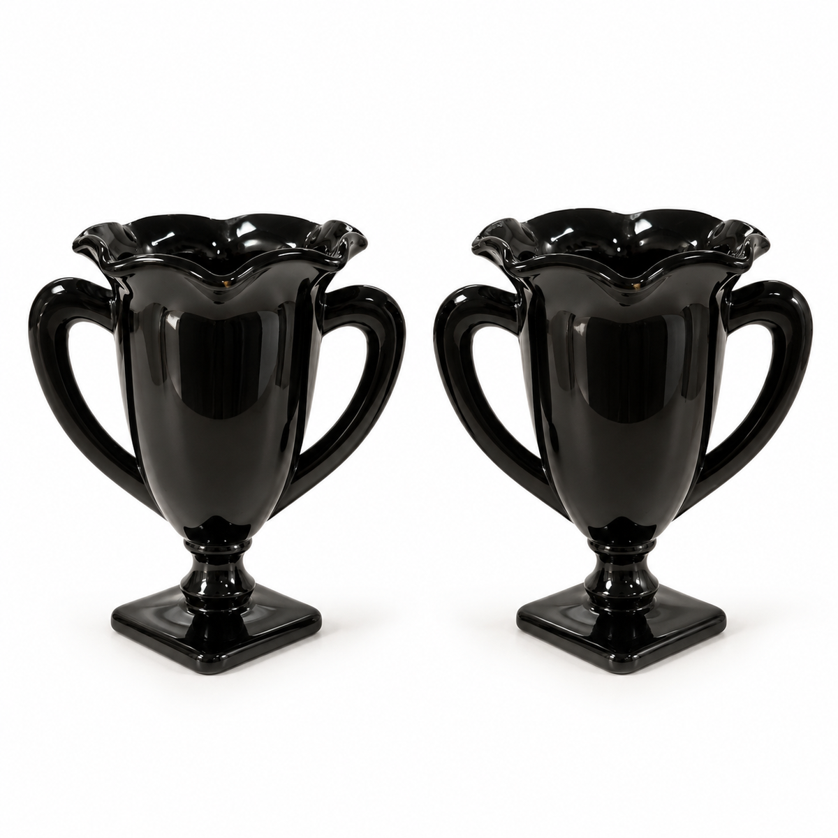 Pair of L.E. Smith black amethyst glass trophy vases with ruffled rims and square feet, 7 inches tall, on a white background