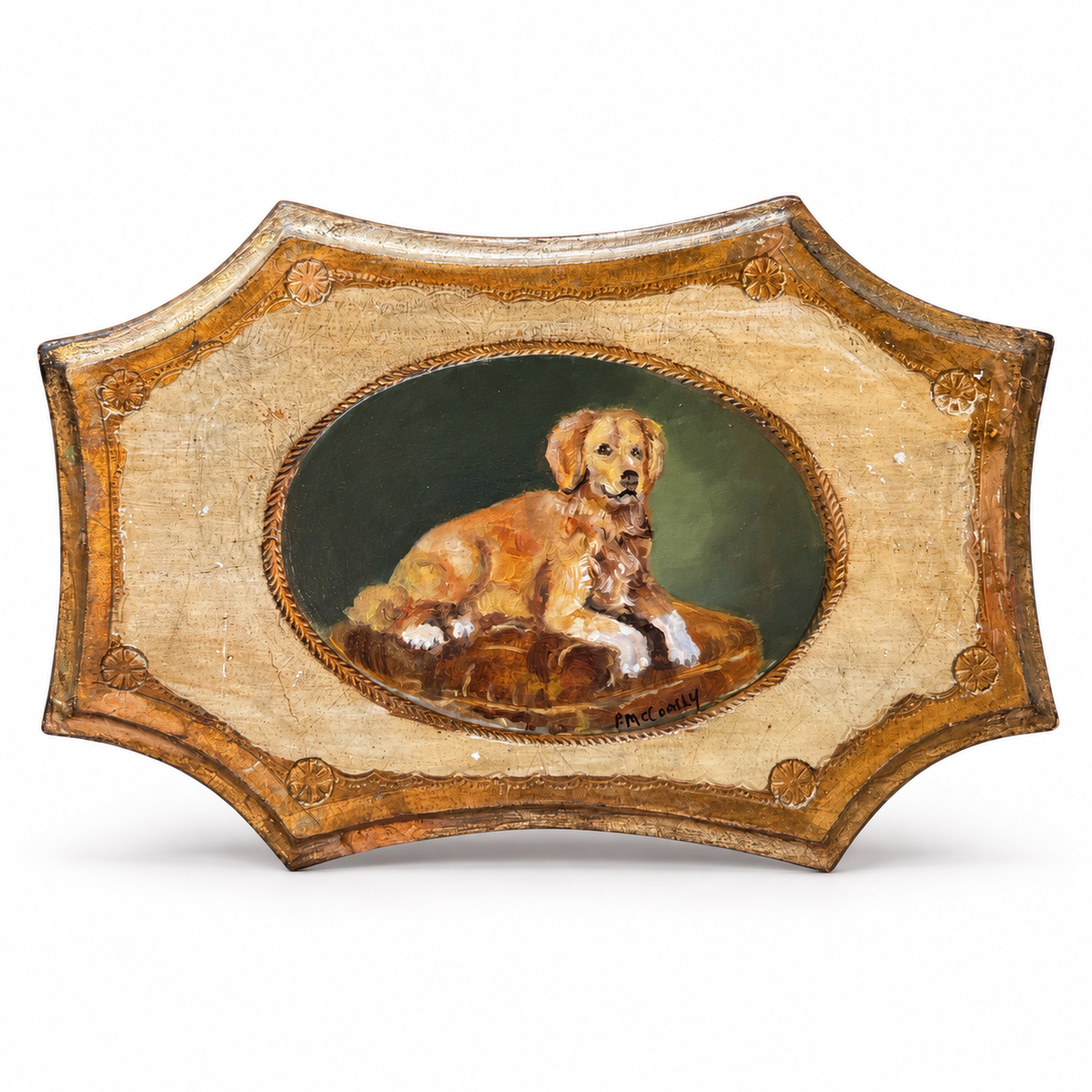 Patti McCarthy original oil of a retriever lying on a cushion in an oval gilt rope border, signed P. McCarthy, on a shaped Florentine board