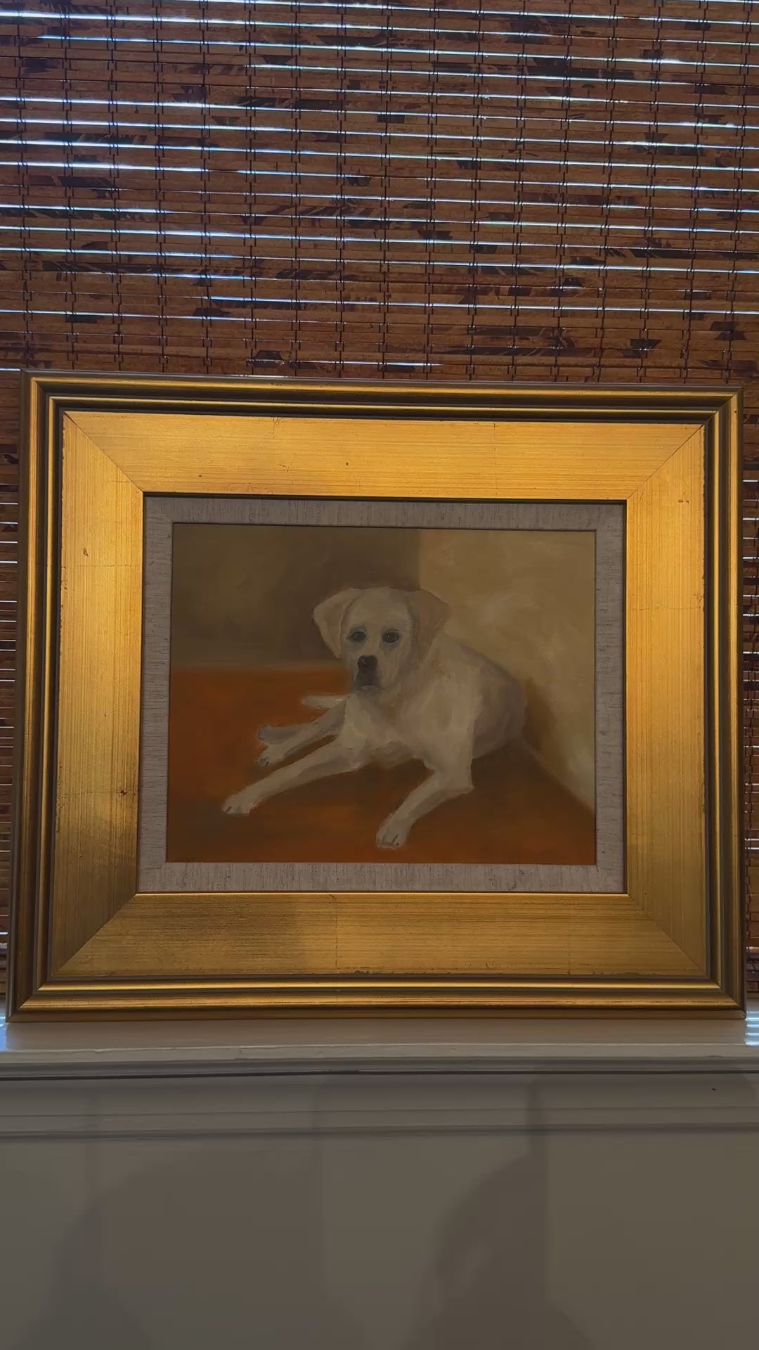 Video of the white Lab oil portrait in its gold frame