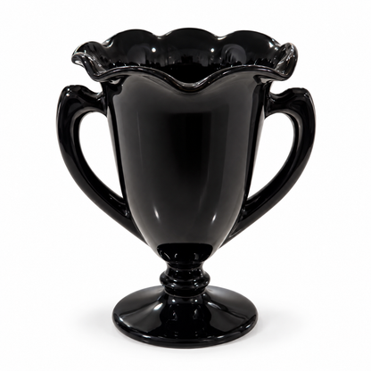 L.E. Smith black amethyst glass two-handled trophy vase with ruffled rim, 8 inches tall, on a white background
