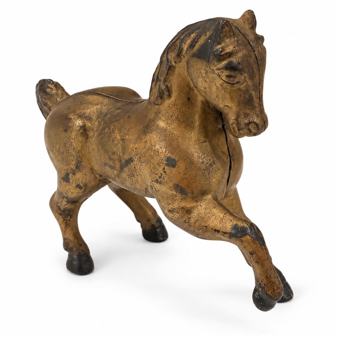 Cast iron prancing horse still bank, gold paint with wear, side view on white