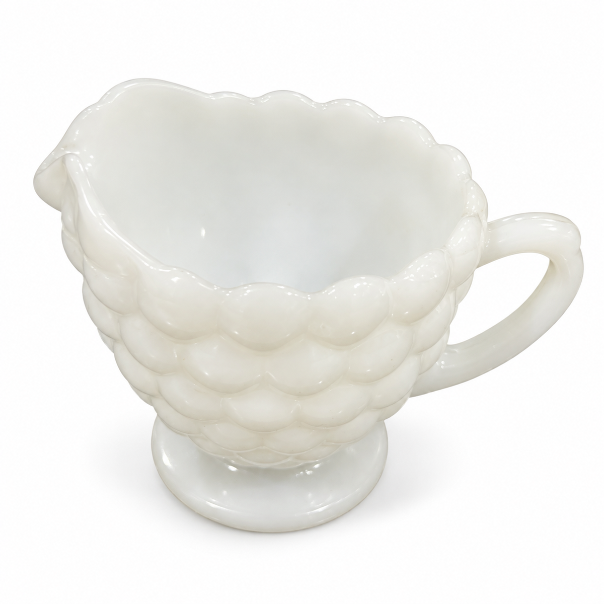 Vintage white milk glass bubble pattern creamer, on white background