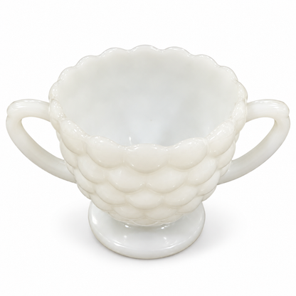 Vintage white milk glass bubble pattern sugar bowl with two handles, on white background