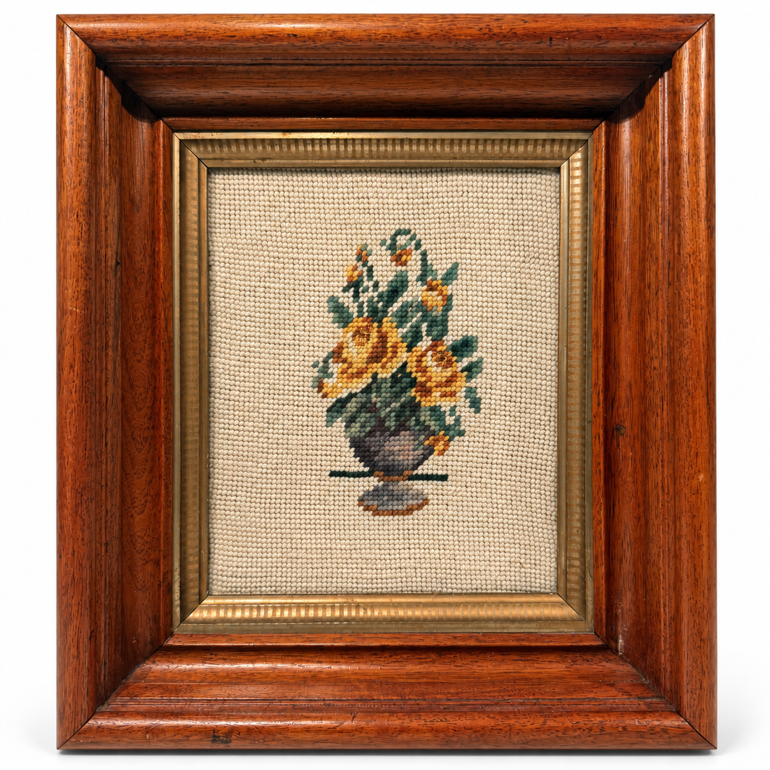 Vintage needlepoint of yellow roses in an urn, gold liner and deep wood frame